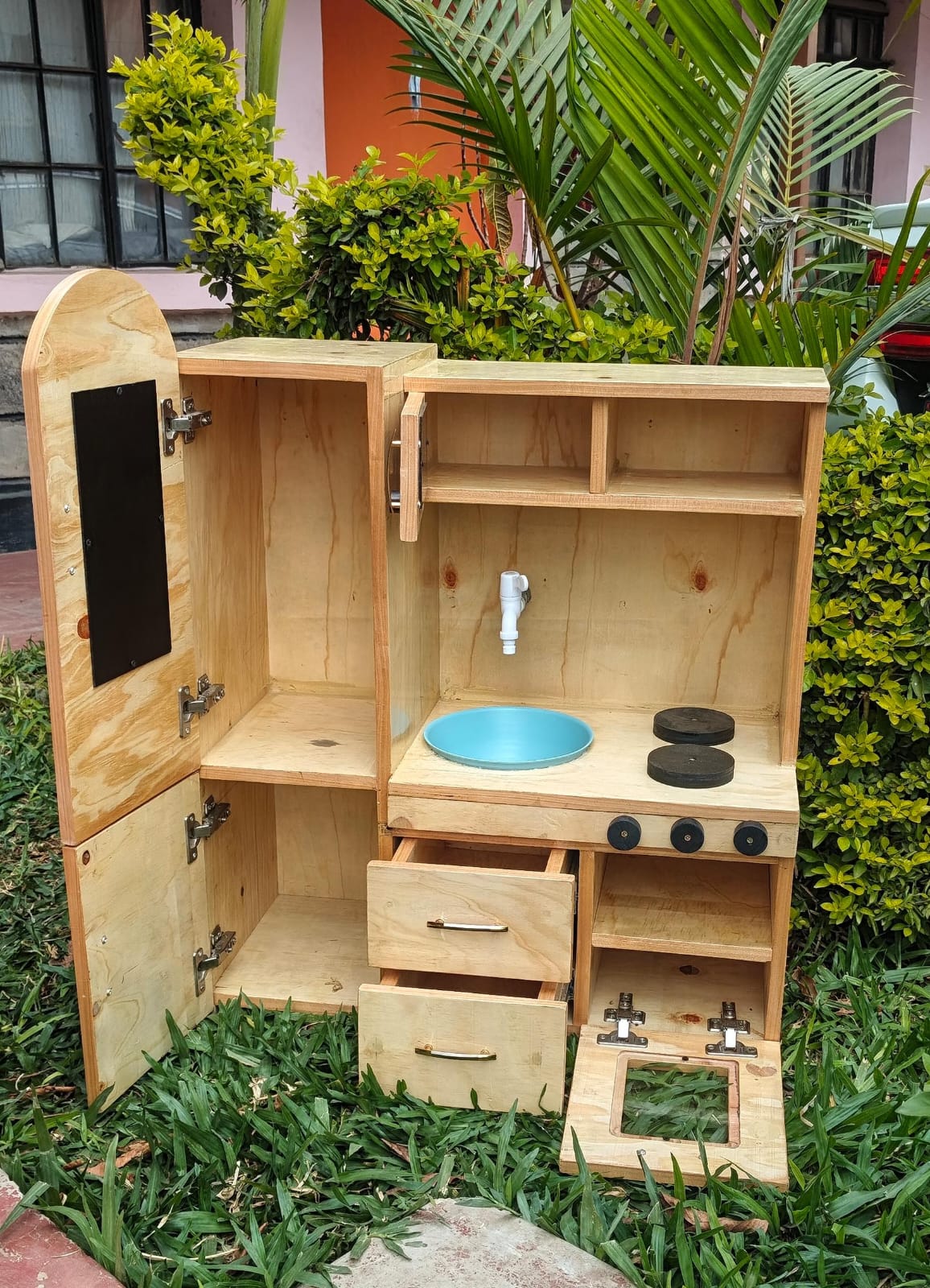 Indoor wooden play kitchen for Montessori classrooms