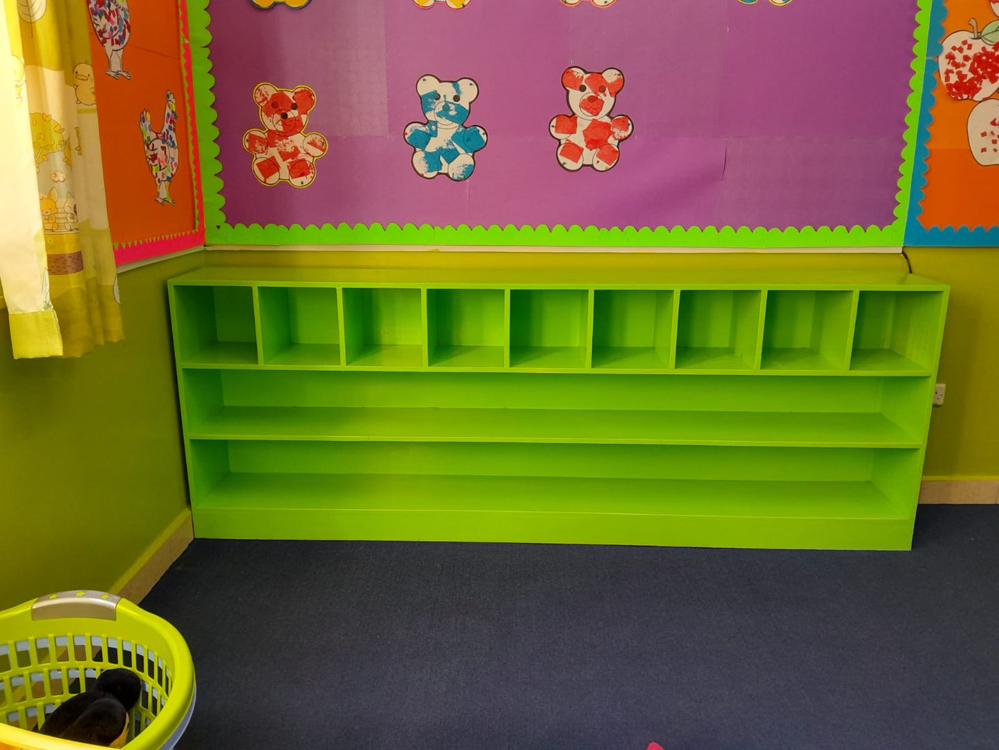 Storage shelves for toys and books in kids learning environments
