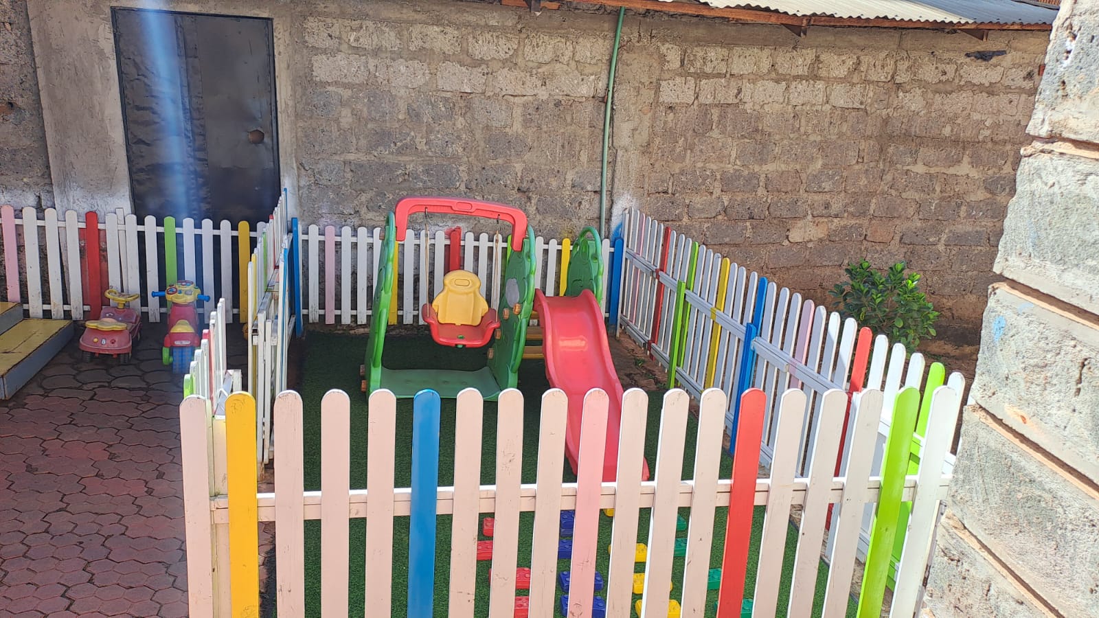 Bright non-toxic wooden play fence for backyard and classroom spaces