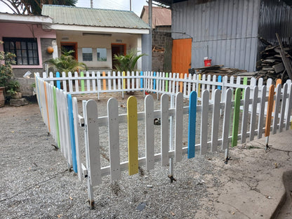 Colorful wooden picket fence for schools and daycares