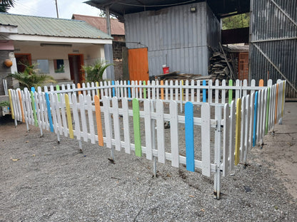 Custom-made wooden picket fence in Kenya