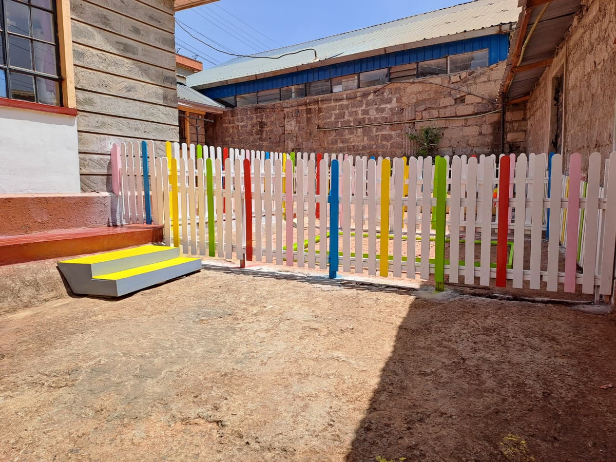 Custom-made wooden playground fencing in Kenya