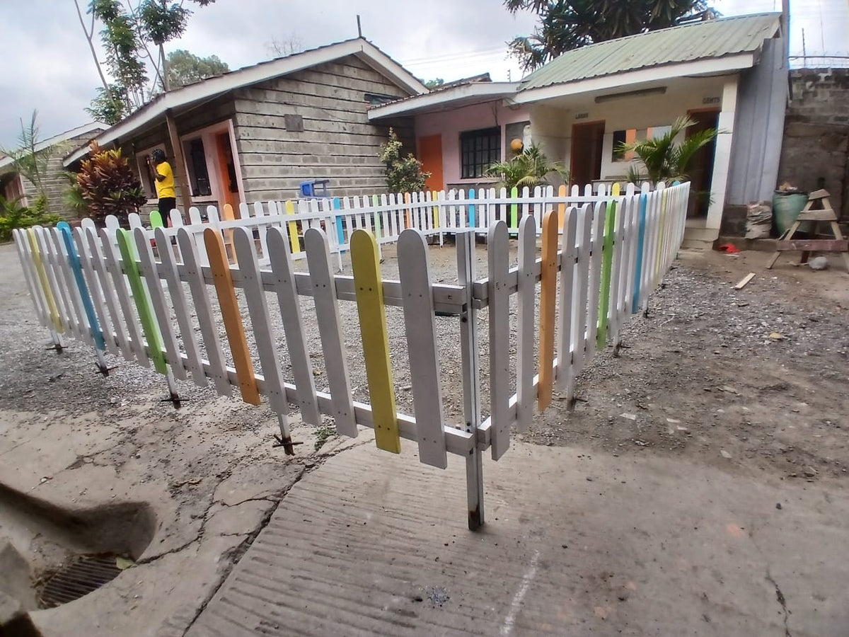 Decorative wooden picket fence for children’s playgrounds