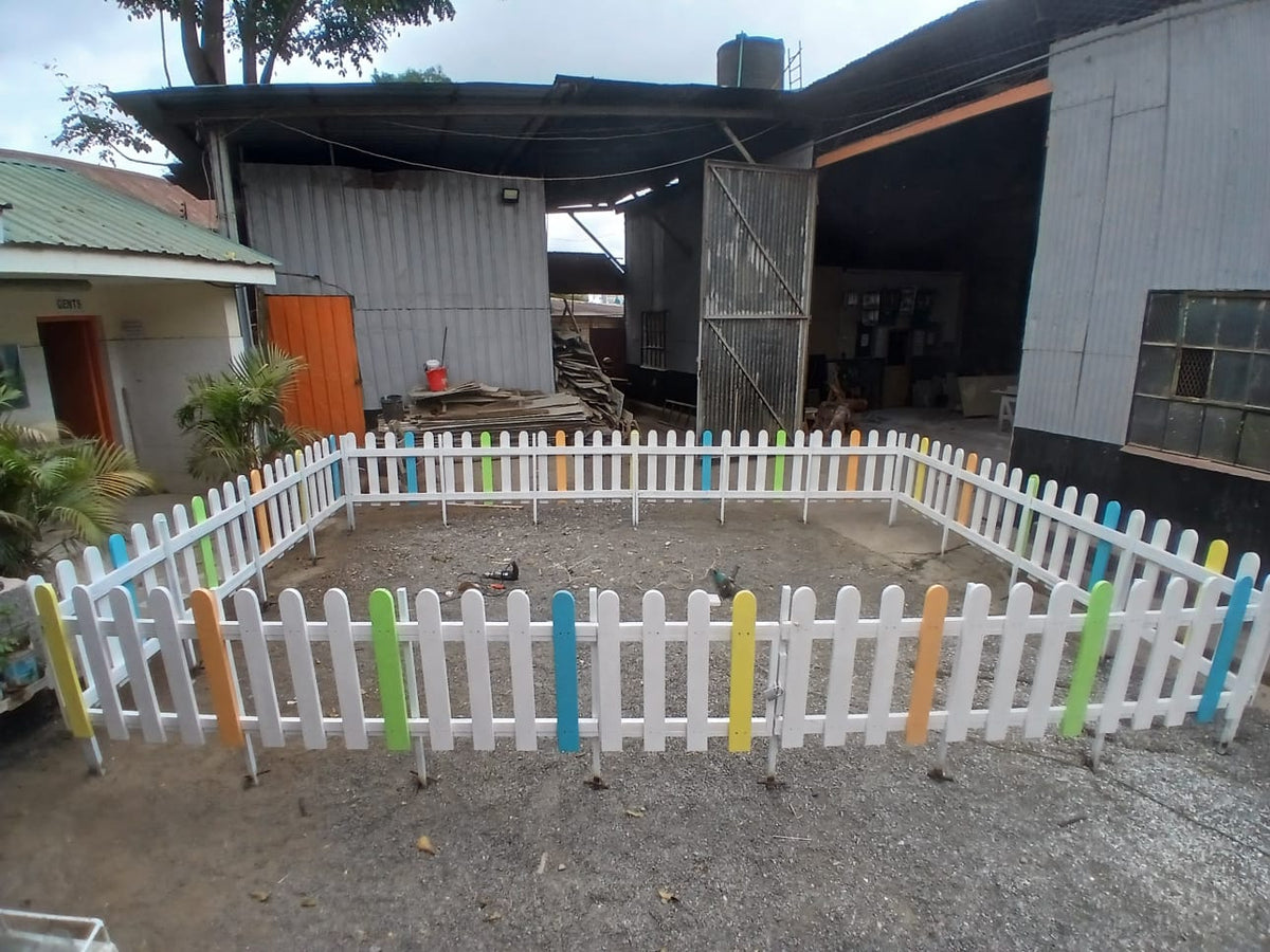 Durable wooden picket fencing for playgrounds and schools