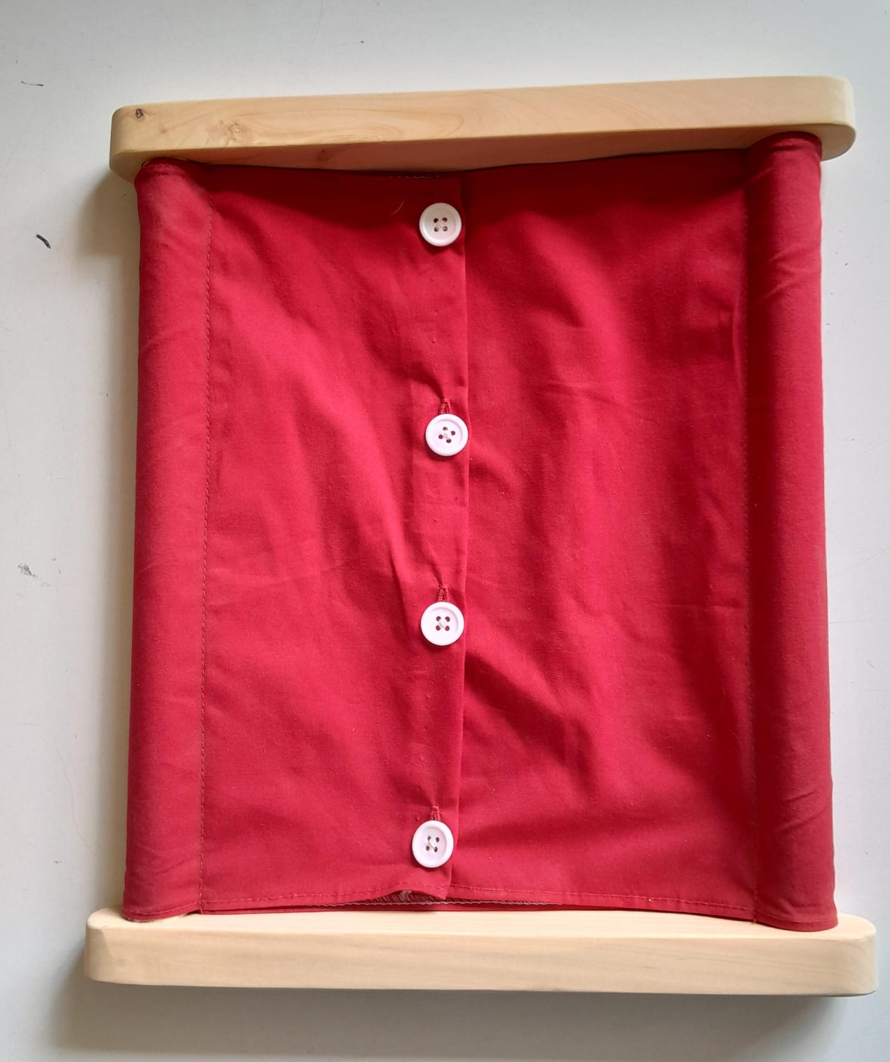Educational wooden button dressing frame from Wow Kids Toys