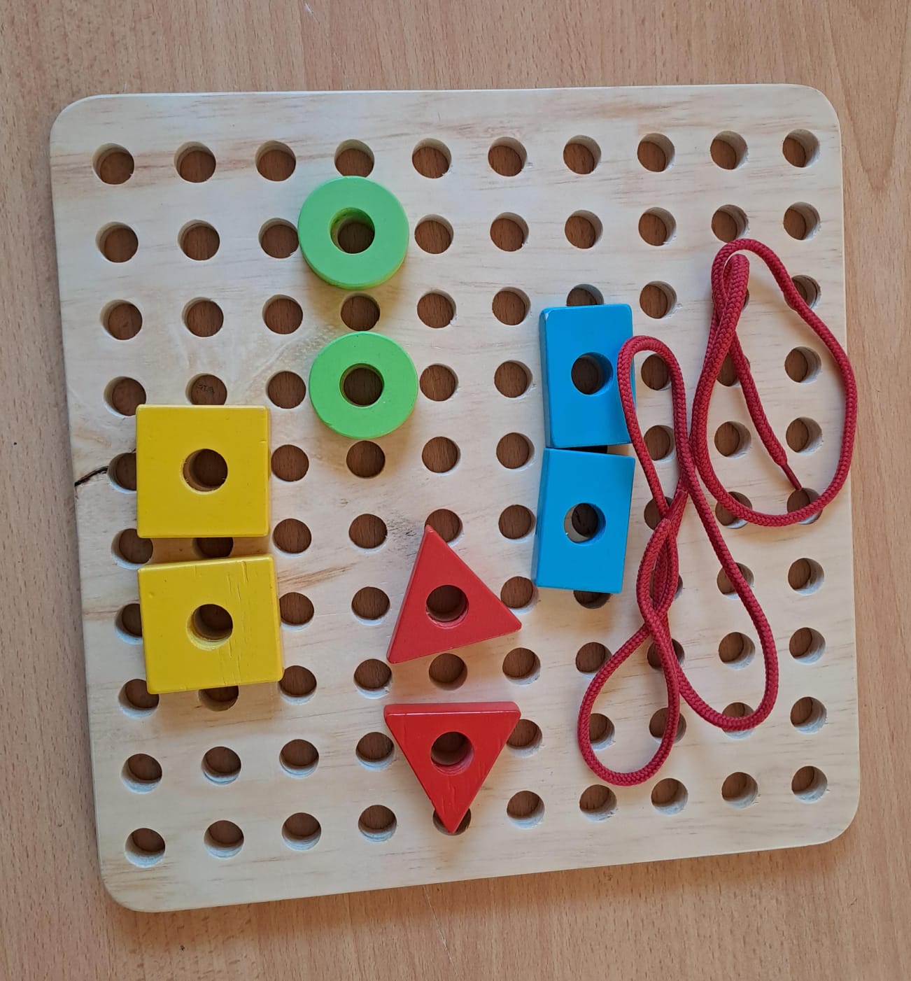 Educational wooden lacing board for CBC classroom and therapy use Kenya