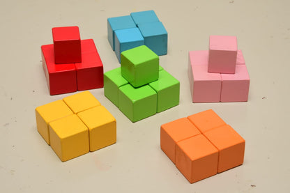 Kids building towers with wooden blocks educational toy set"