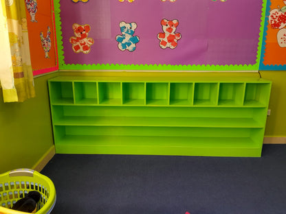 Storage shelves for toys and books in kids learning environments