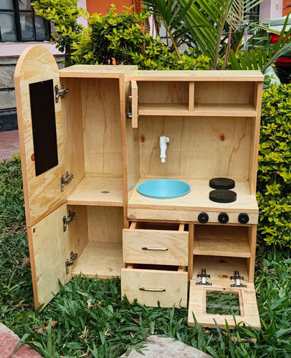 Wooden pretend play kitchen in Kenya