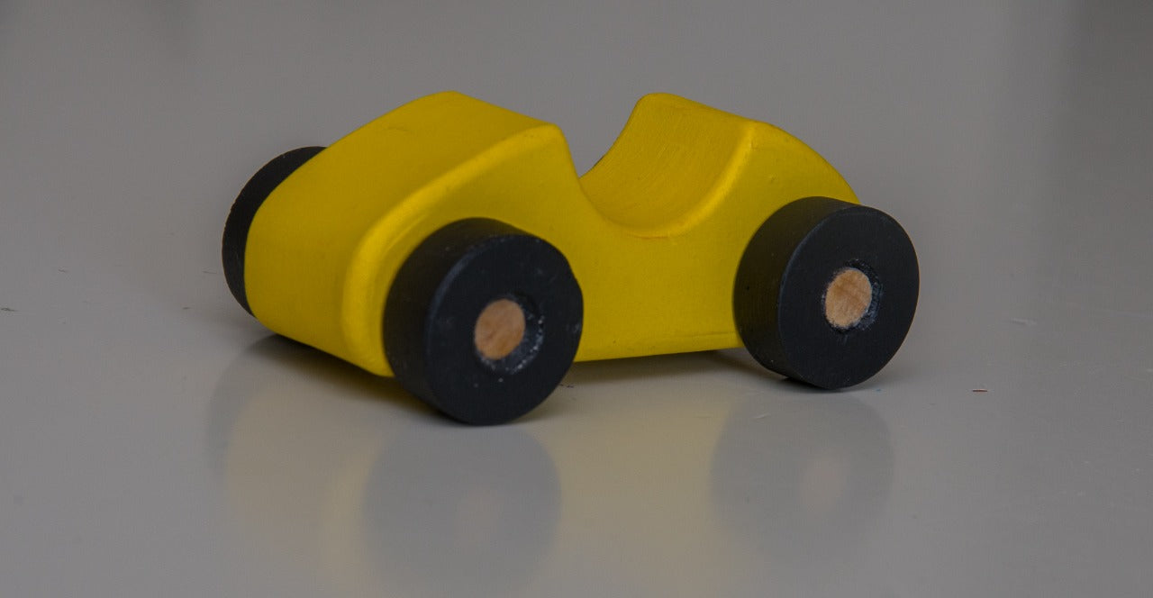 Durable wooden toy car for kids, ideal for imaginative play.