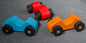 Durable wooden toy car for kids, ideal for imaginative play.