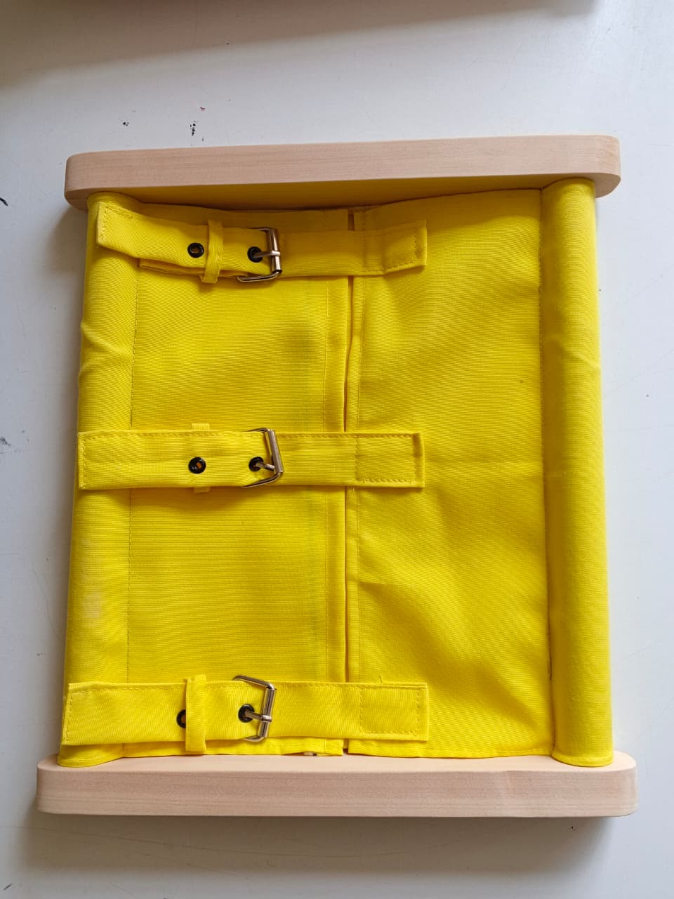 Wooden buckle dressing frame toy for fine motor skills development in toddlers Kenya