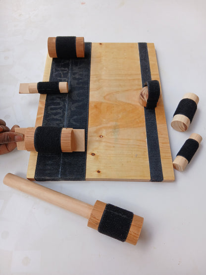 Wooden busy board for kids – occupational therapy toy in Kenya