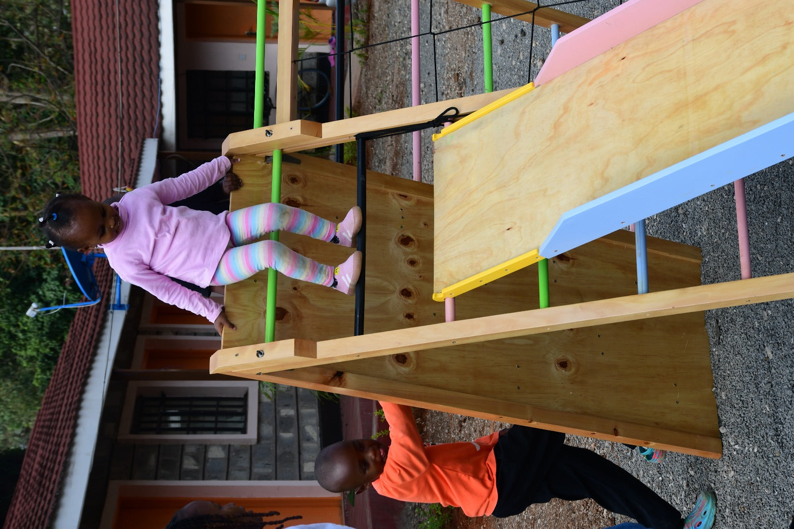 Wooden_jungle_gym_with_slide_and_climbing_wall_upto_13_yrs