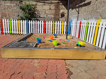 Wooden kids sand pit designed for daycare, school, or home outdoor fun