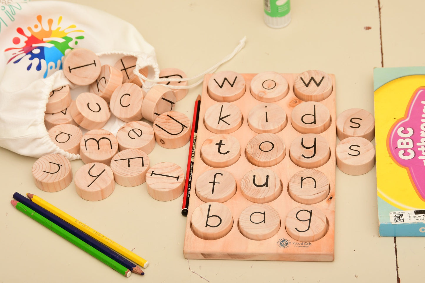 Wooden letter coins and word formation game for early literacy and multilingual learning Nairobi