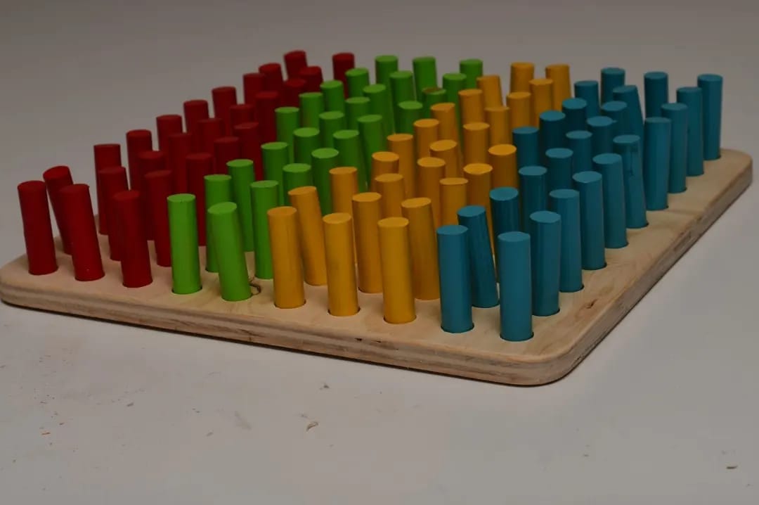 Wooden peg board with 100 colorful pegs for counting, sorting and pattern learning