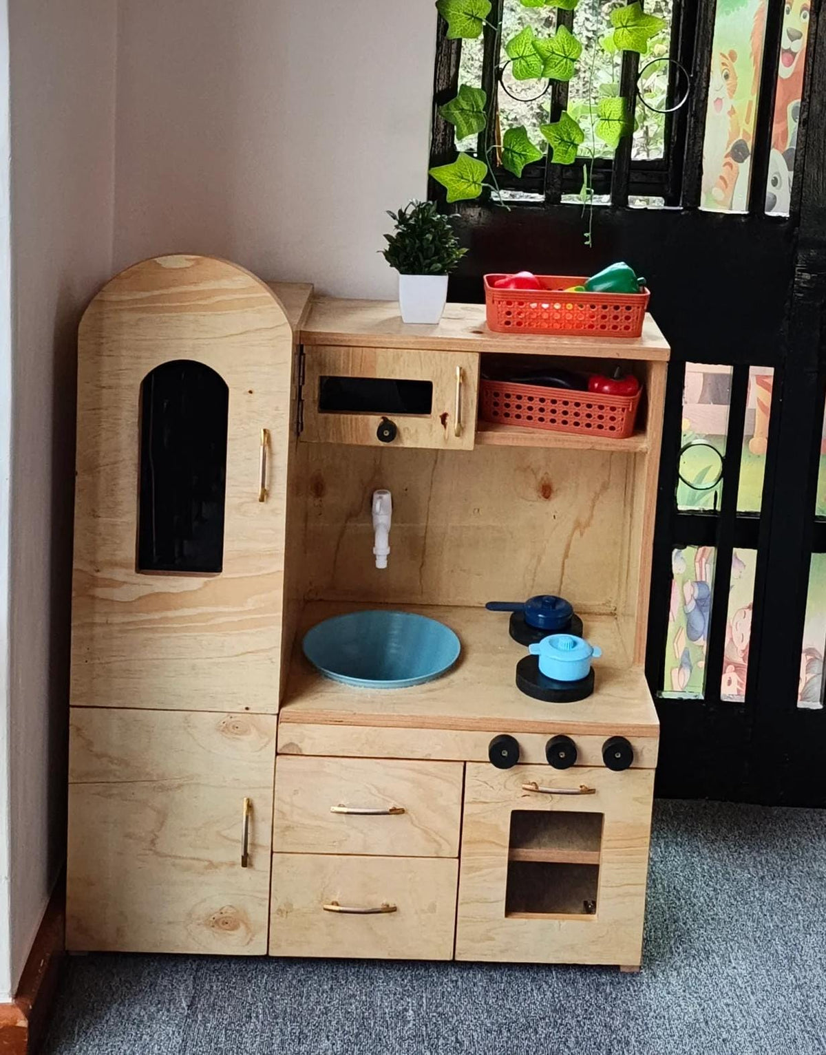 Wooden pretend kitchen for children
