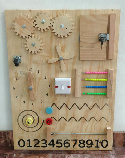 Wooden busy board for toddlers with locks, latches, switches, and sensory elements