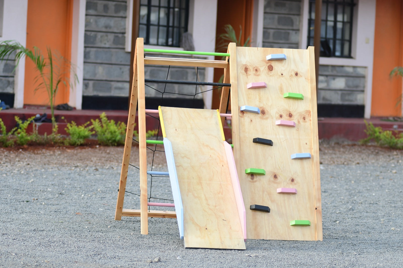 Foldable wooden jungle gym for kids with slide rope and climbing wall